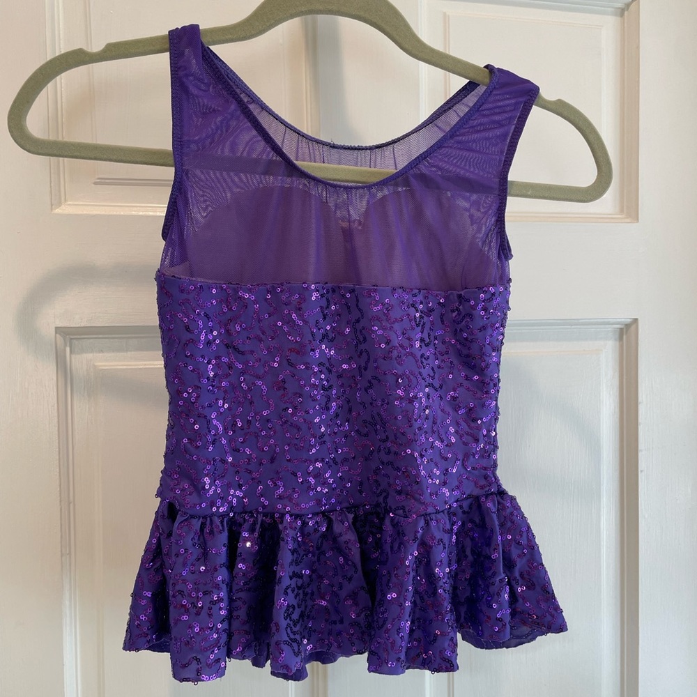 Purple sequined dance costume top.